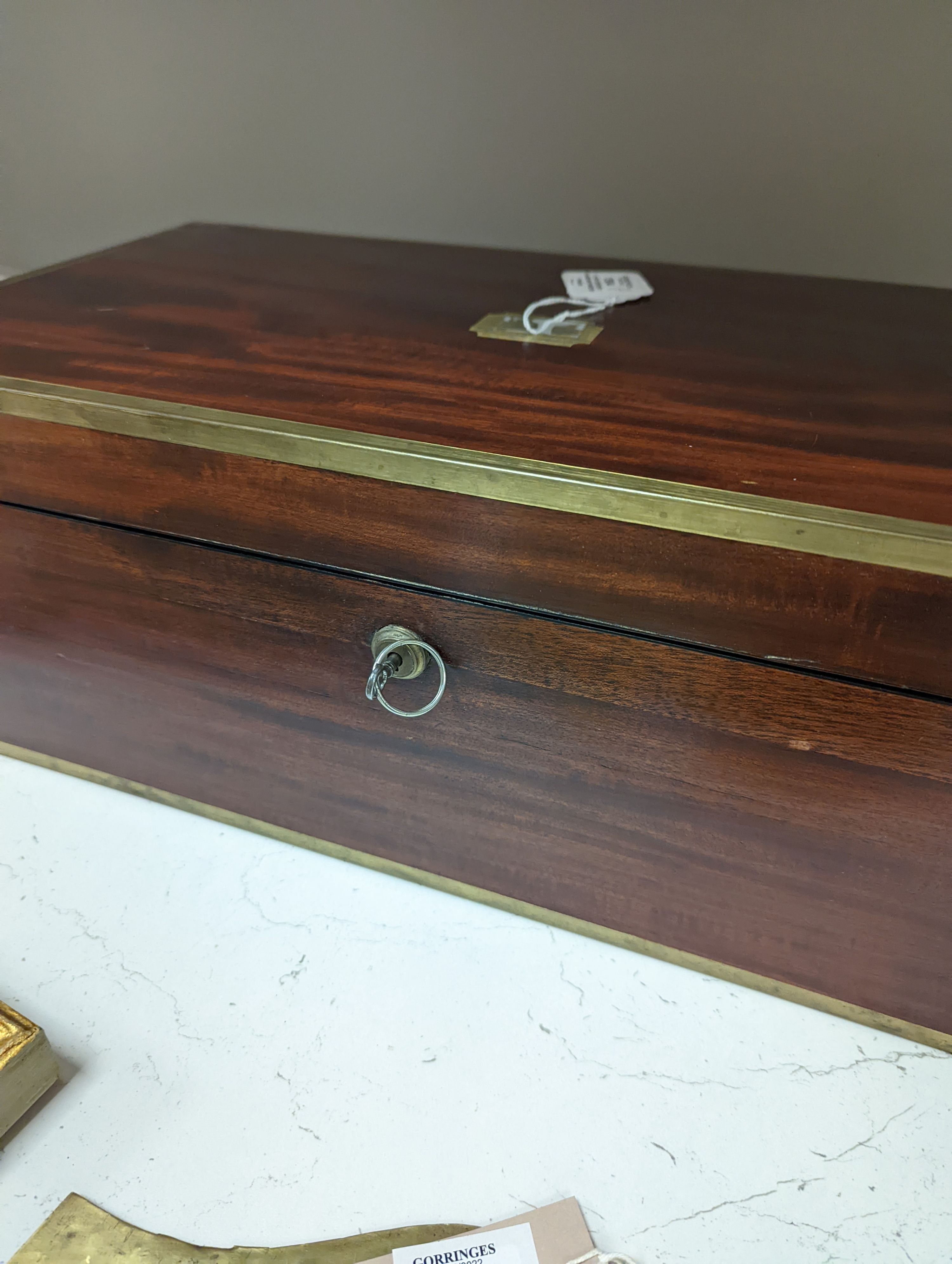 A 19th century mahogany and brass mounted writing slope, 51cm